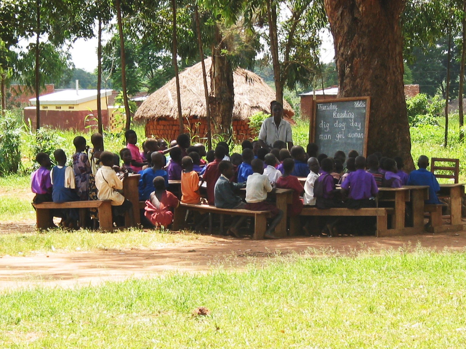 Teacher and students in outdoor class Teacher and students in outdoor class