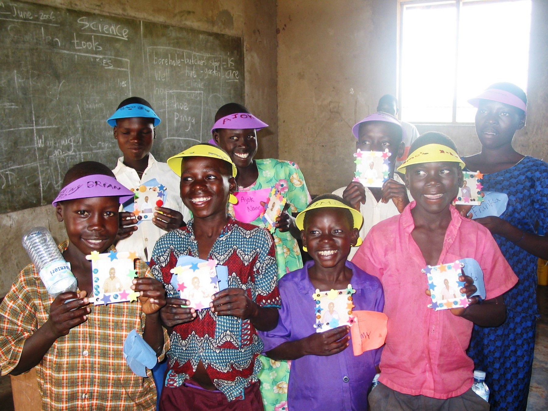 Children showing off craft projects