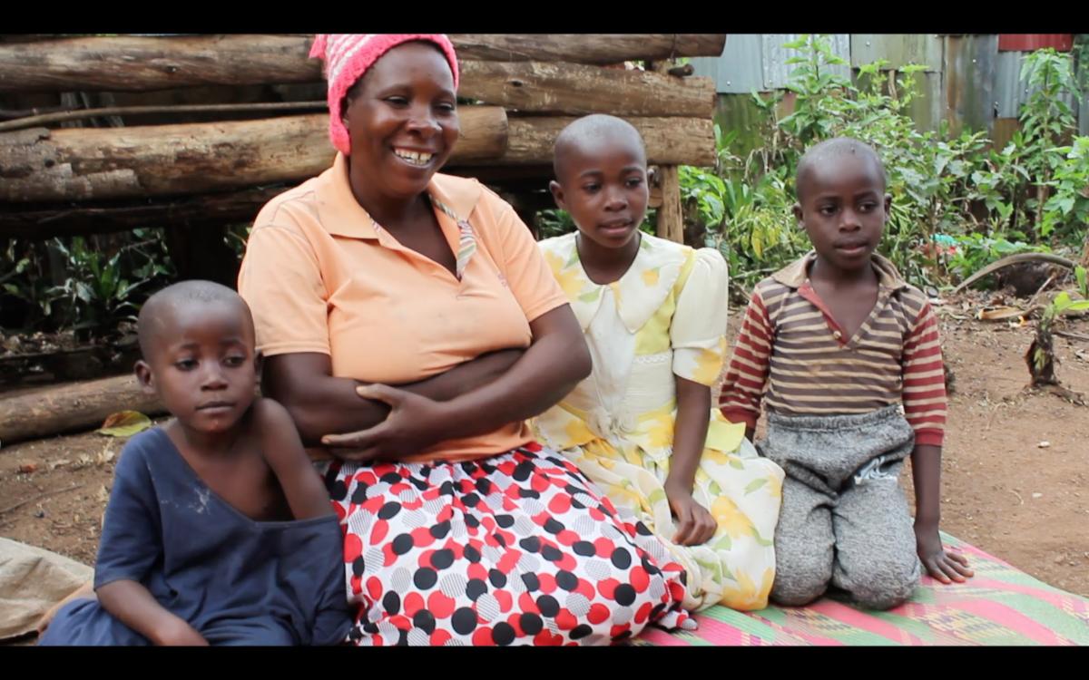 Smiling woman and children Smiling woman and children