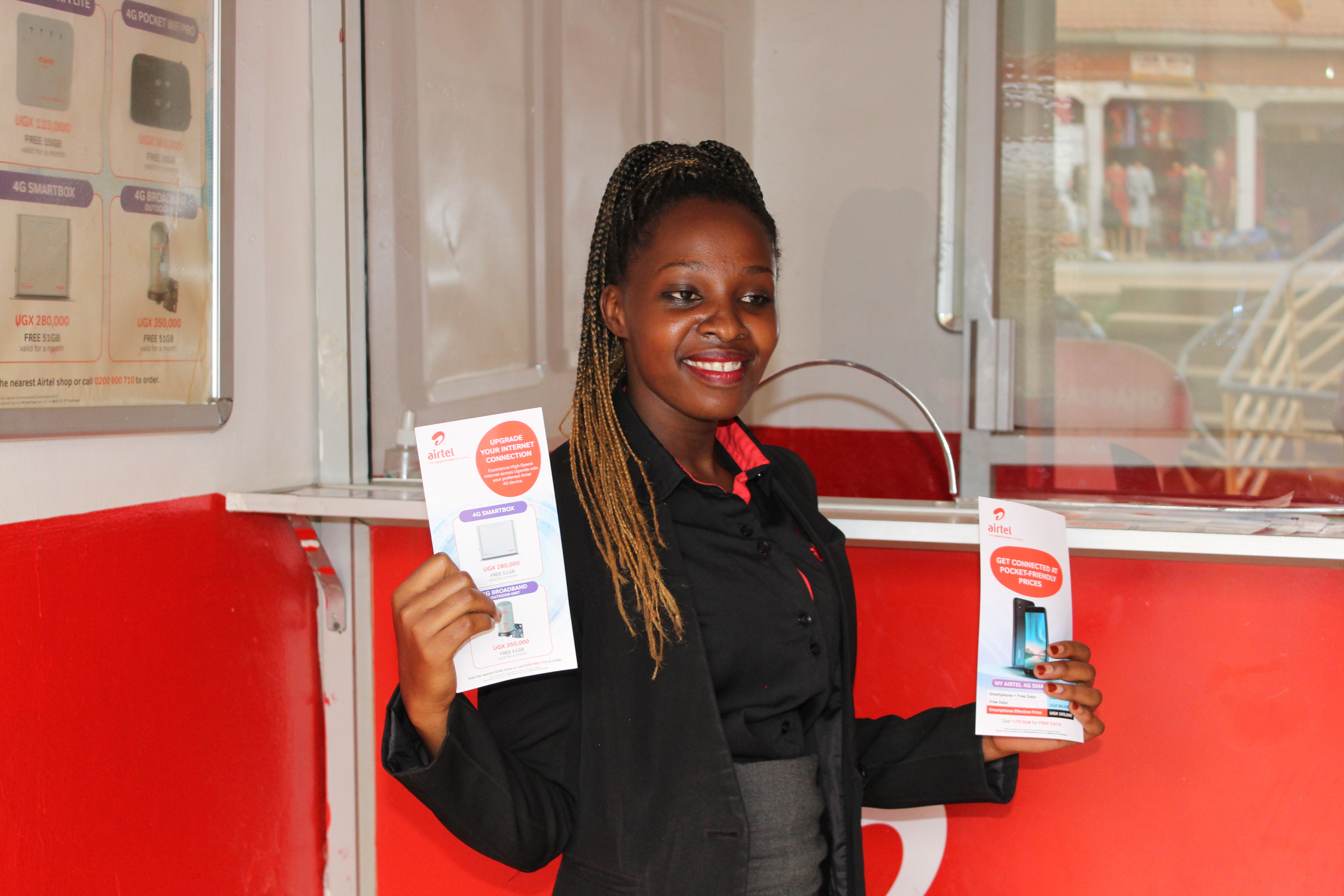Josephine holding up certificate