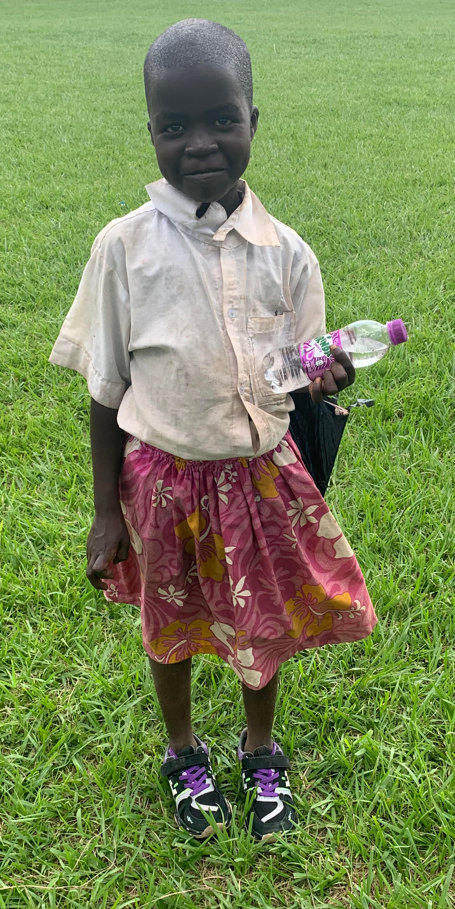 Esther showing off her new shoes A young girl wearing new shoes