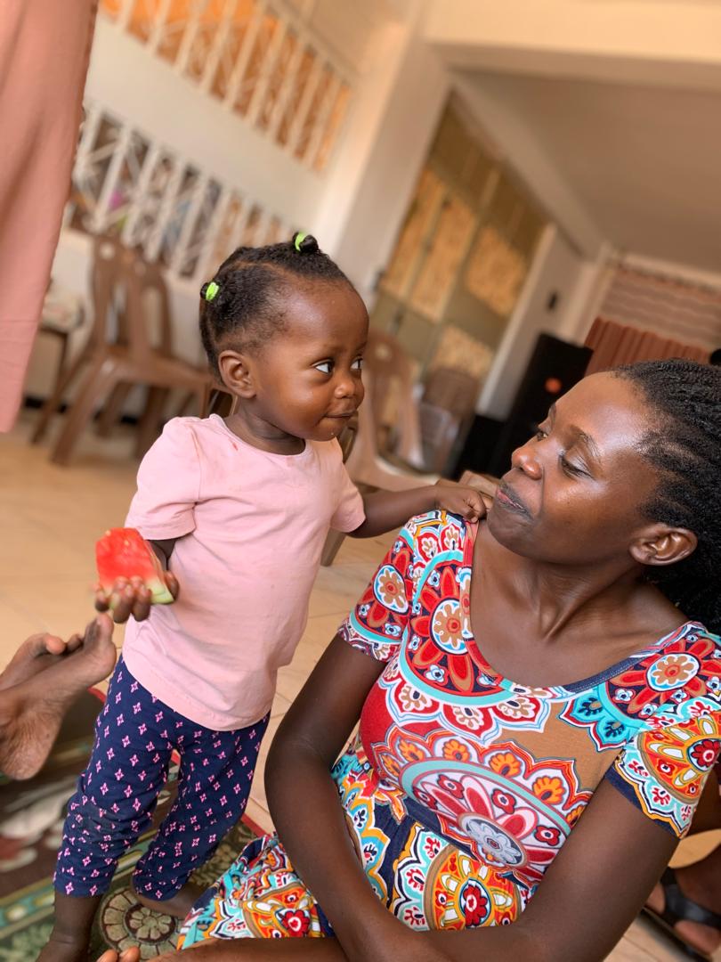 Jenny and daughter Karissa Mother holding a toddler