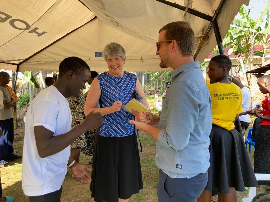 Catharine and Caleb Catharine and Caleb with a student, laughing