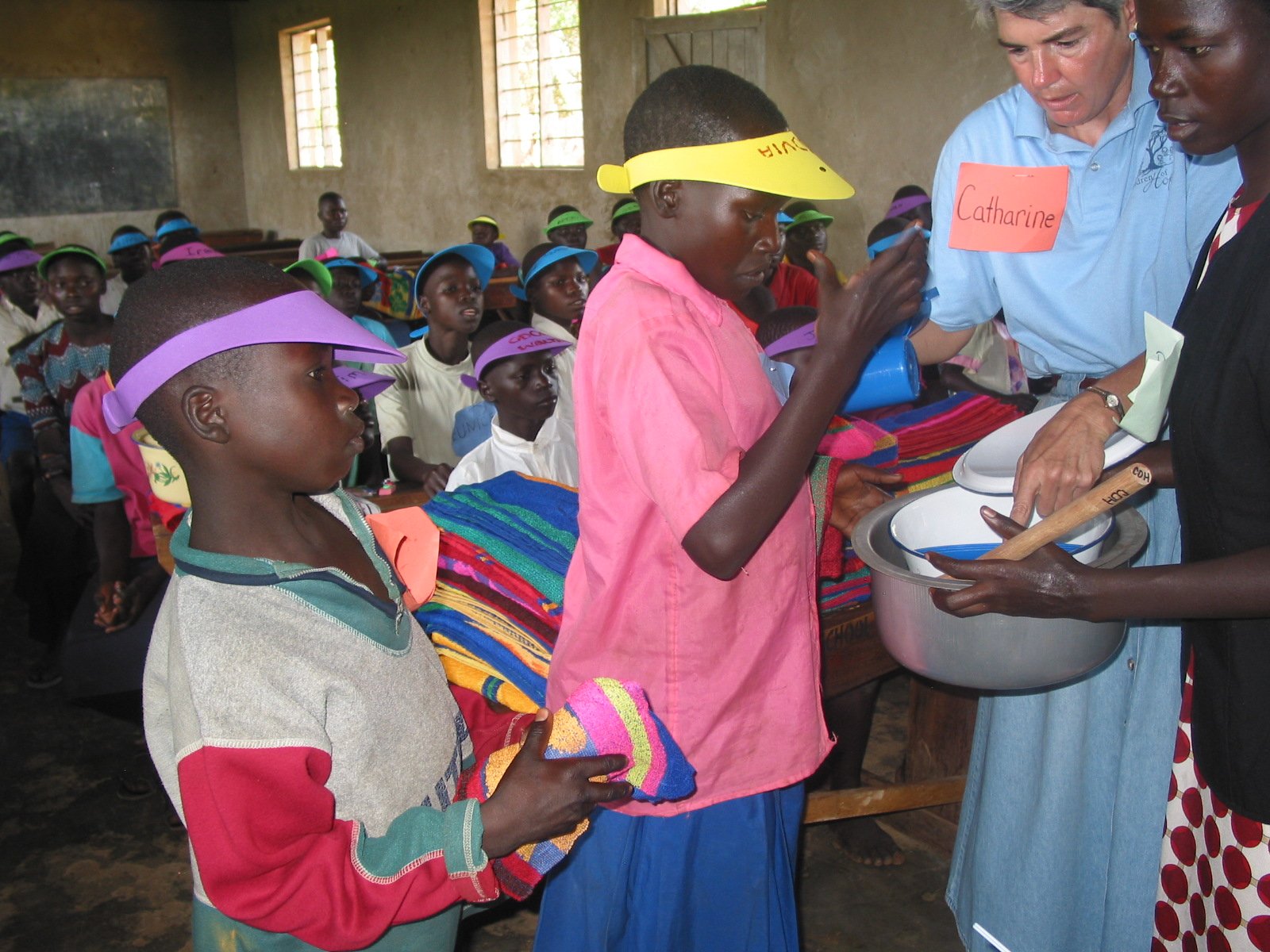 Catharine with group of young children doing crafts