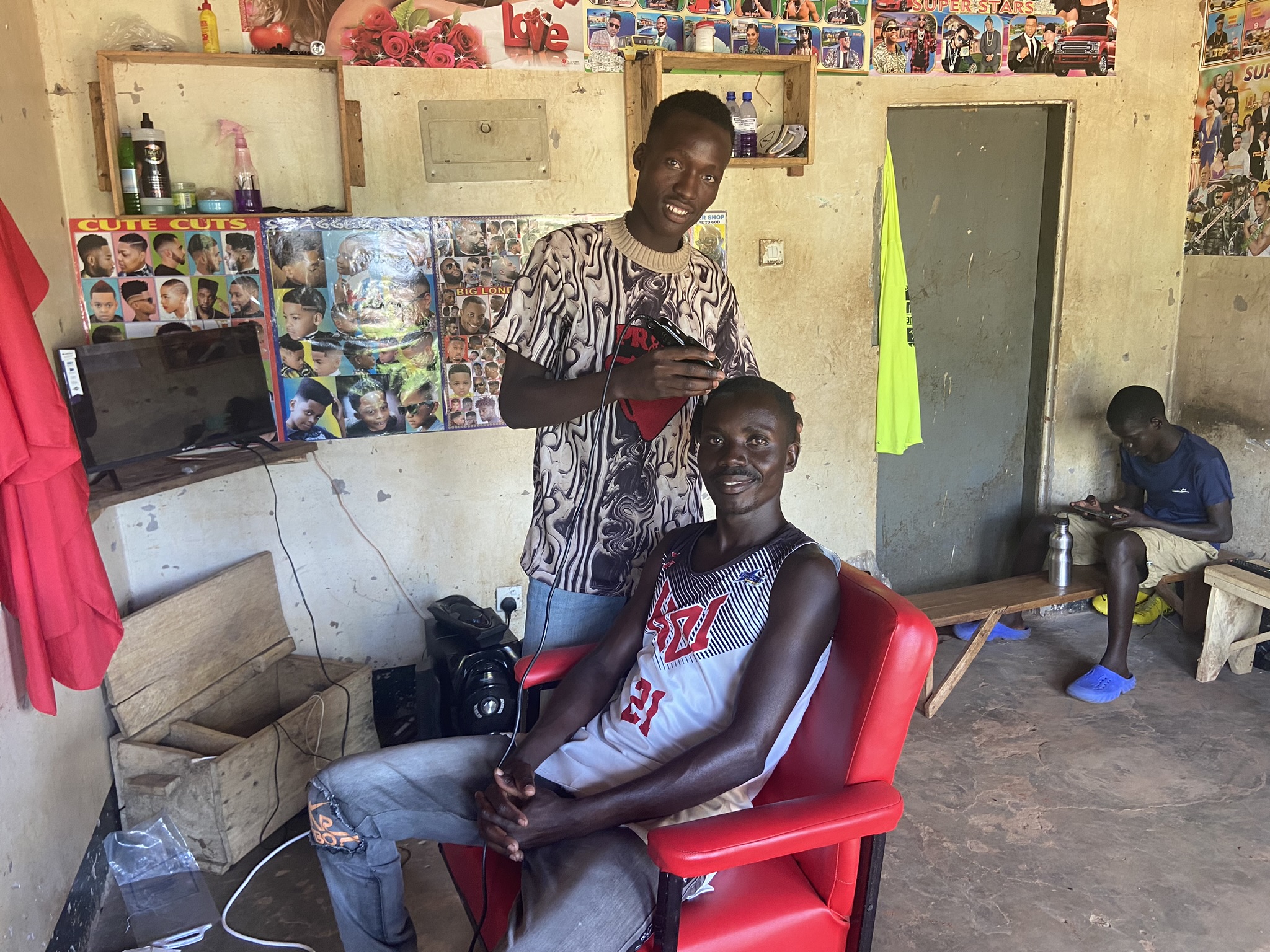Barber and client in a barbershop