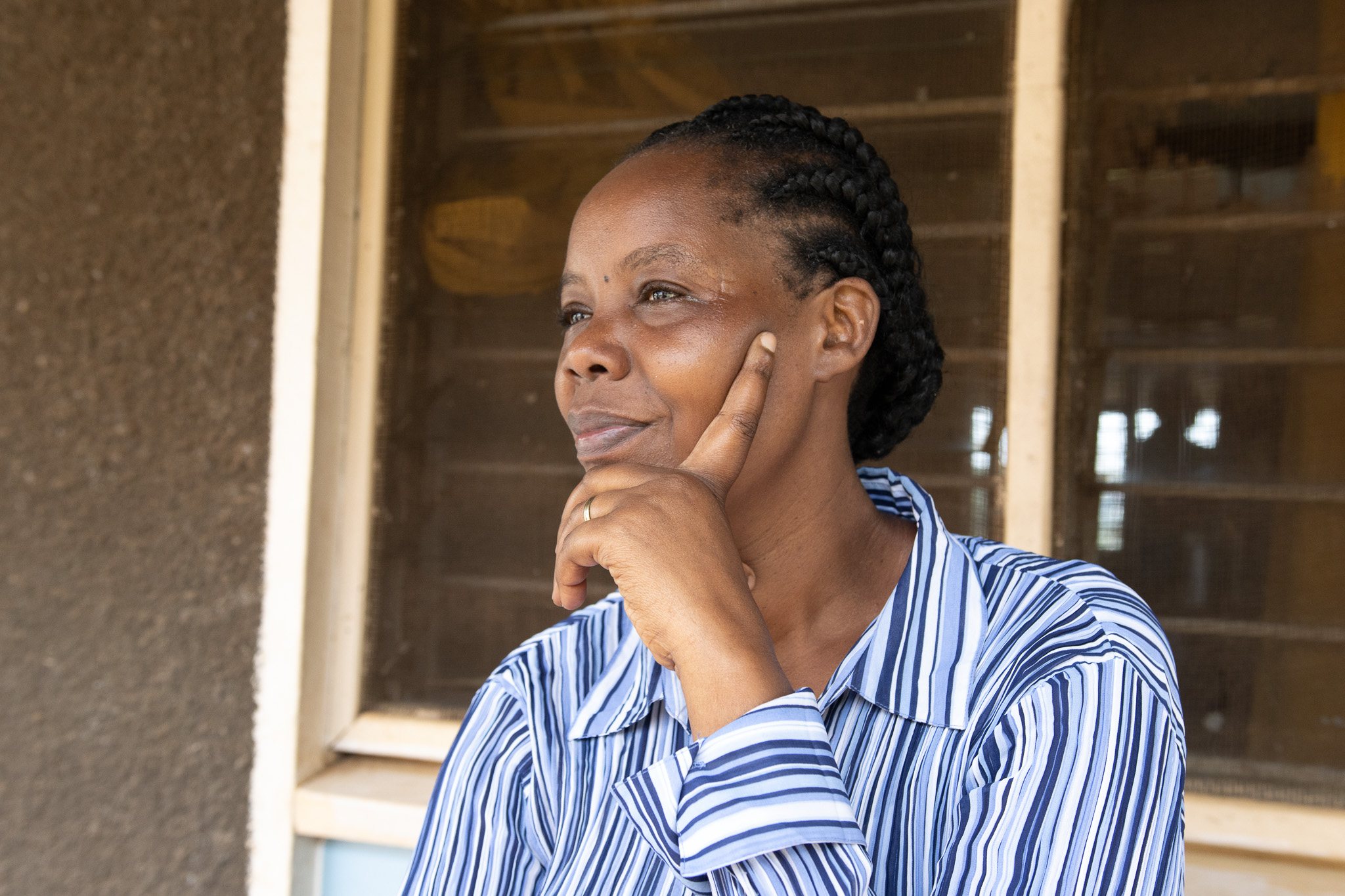 Aunt Rose woman looking right, hand on face