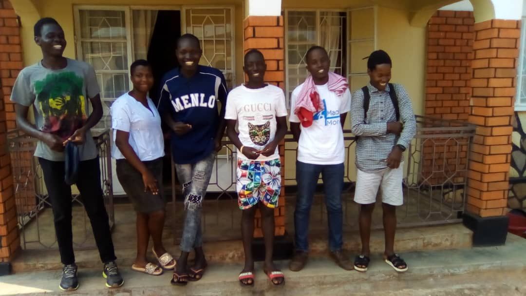 Small group in front of house