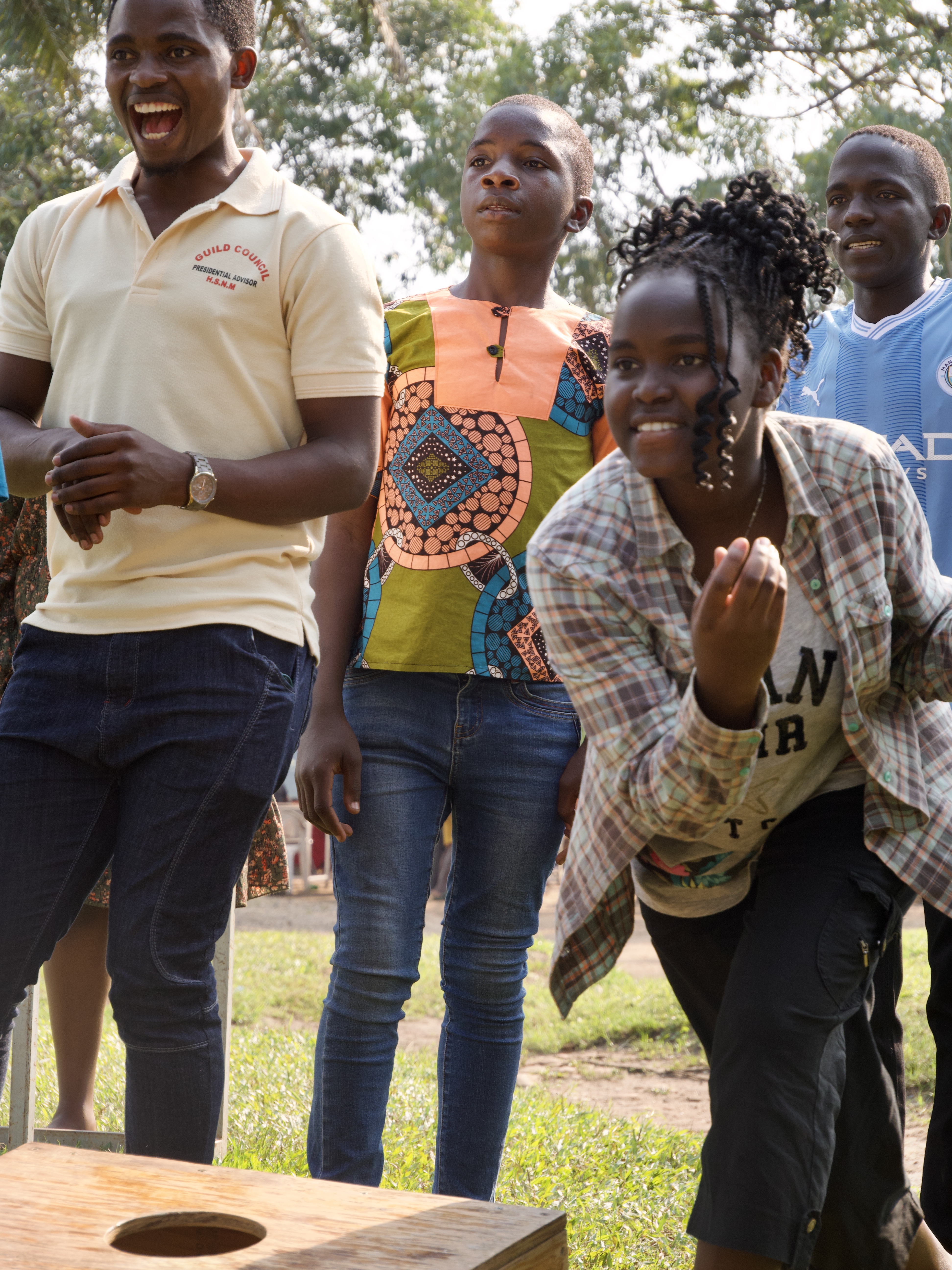 Summit fun Students playing a corn hole-like game